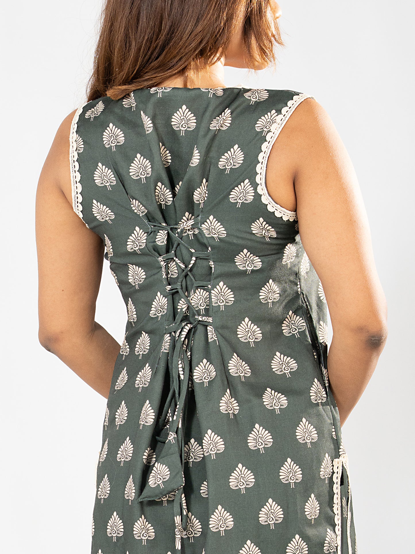 Corset-style back tie-up detail on the Teal Green Peacock Lace Kurta